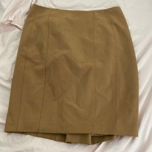 Beige skirt, a little above the knees
